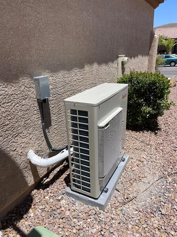 Residential air conditioning condenser unit in University Park
